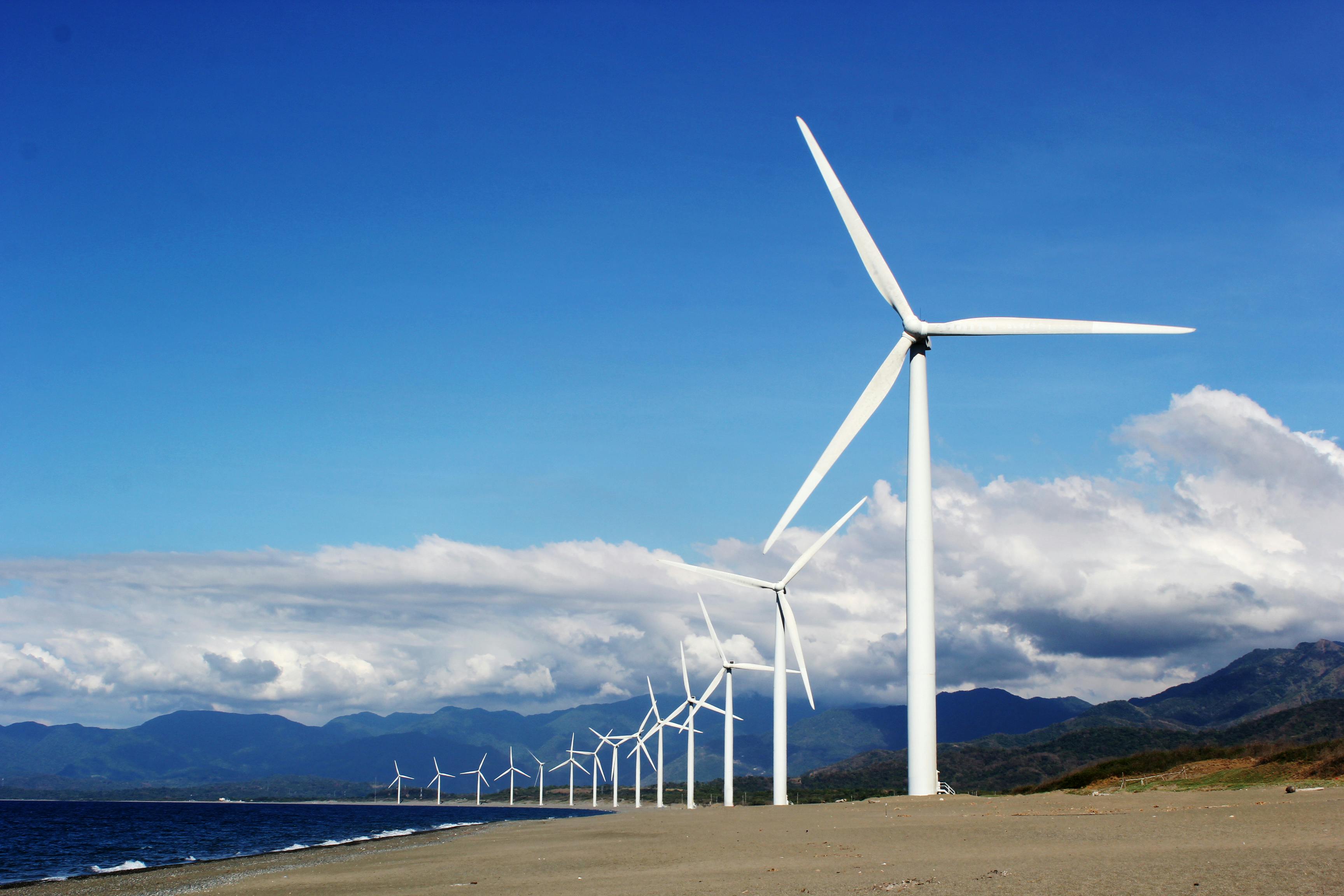 Wind turbines in a landscape with mountains